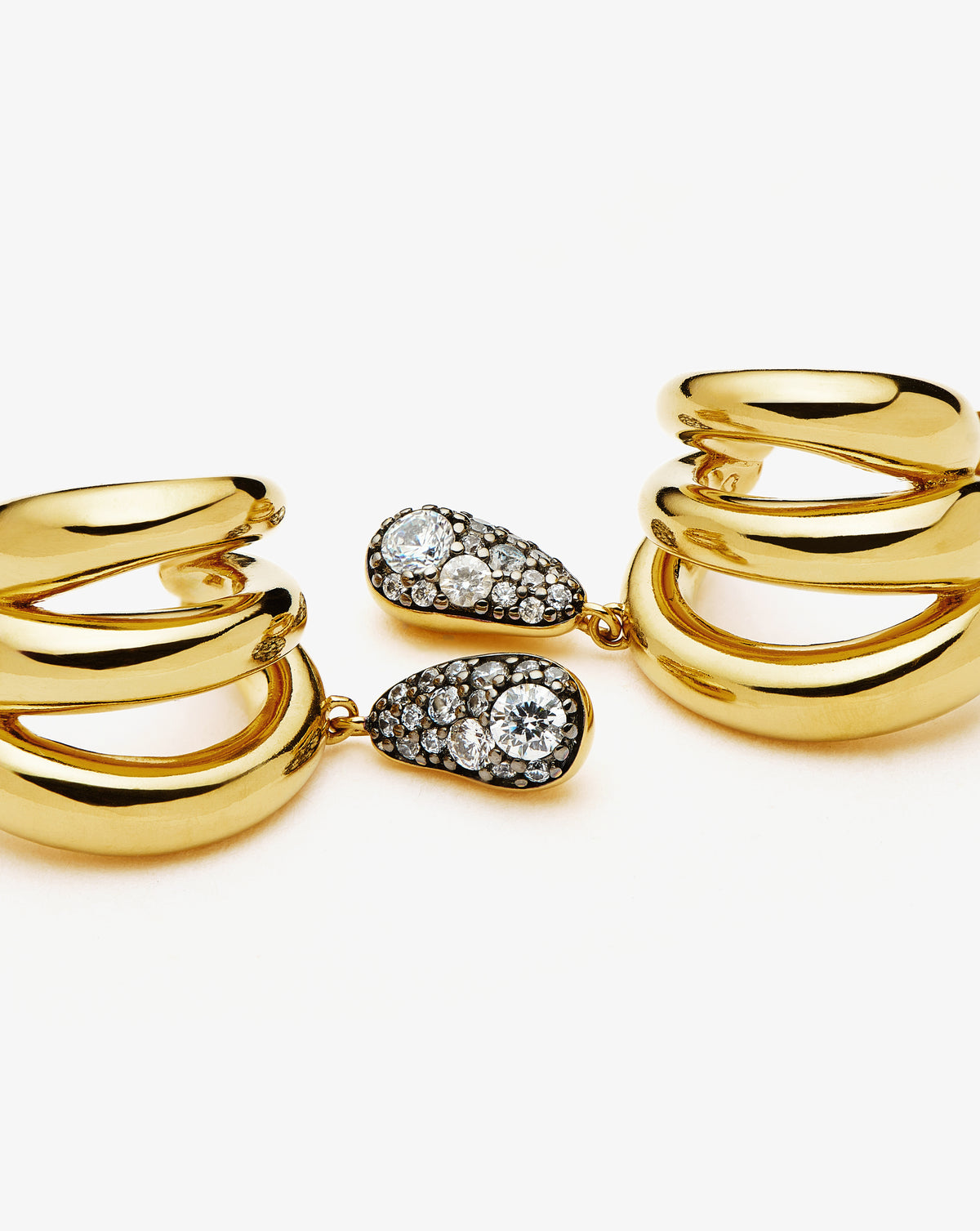 Missoma Molten Teardrop Pave Trio Stud Earrings in gold-plated brass, third view