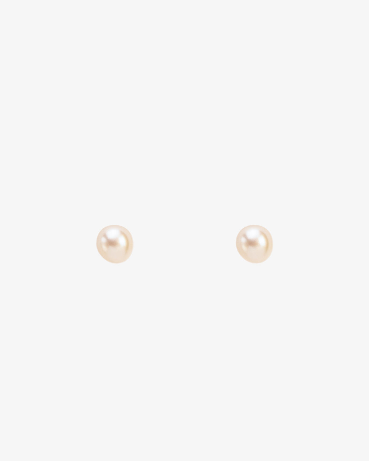 Wouters & Hendrix Pearl Stud Earrings