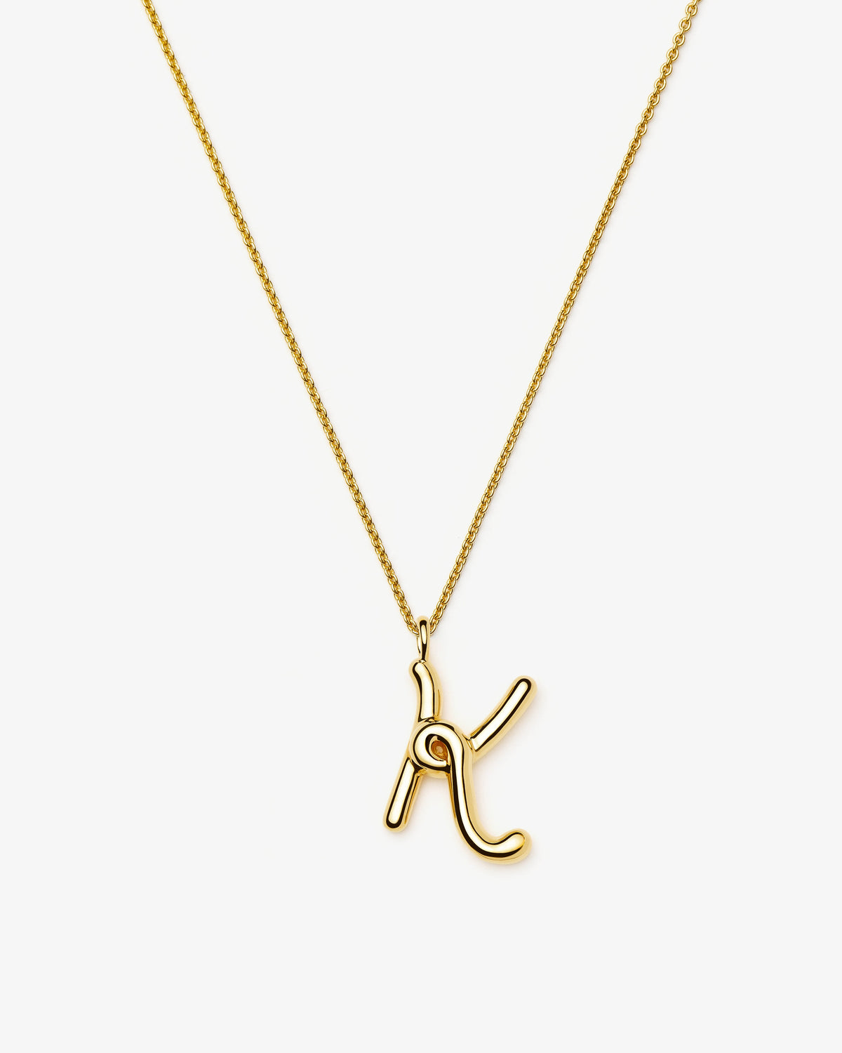 Missoma Curly Molten Initial Pendant Necklace in gold-tone plated metal, letter K, view 11