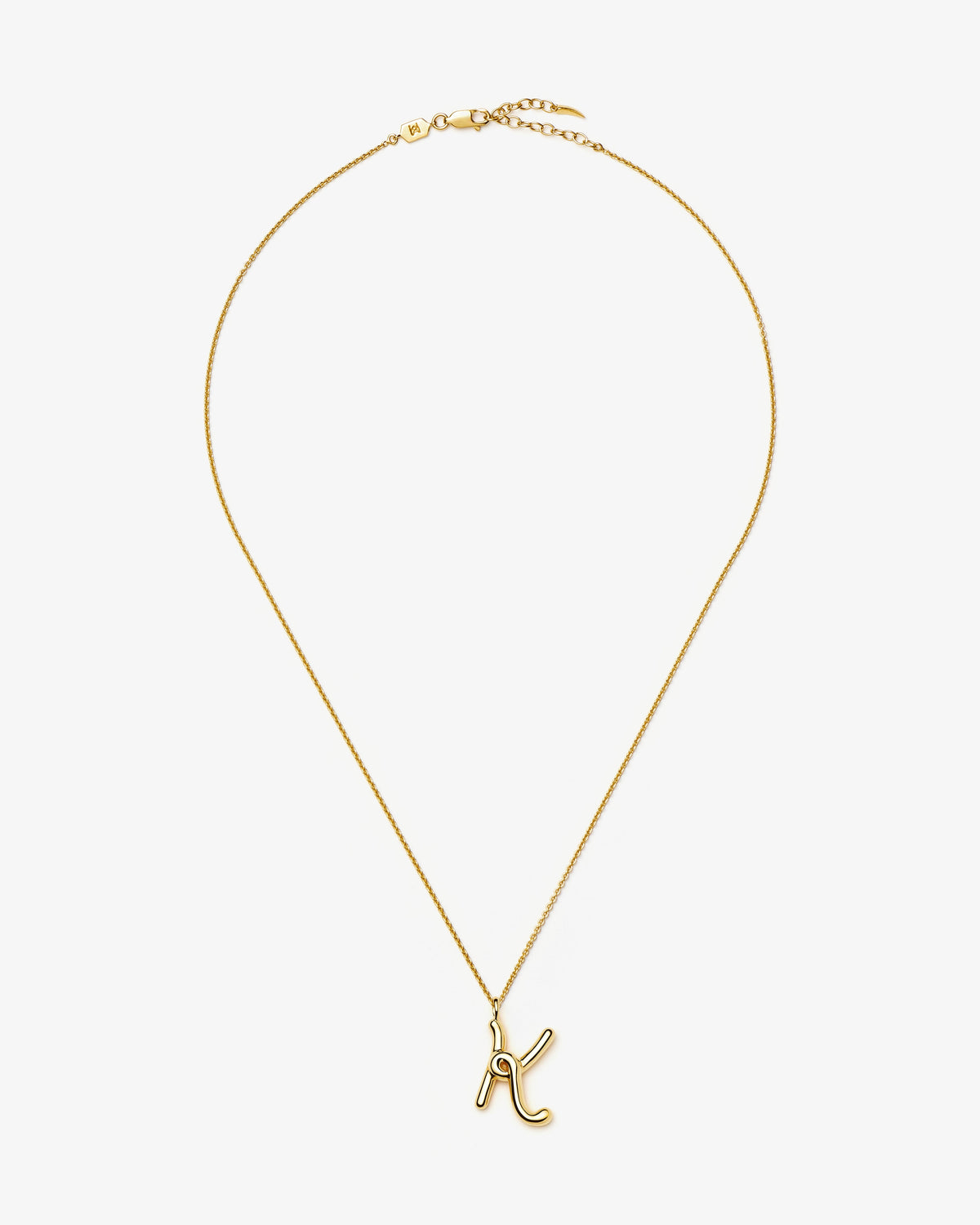 Missoma Curly Molten Initial Pendant Necklace in gold-tone plated metal, letter K, view 12
