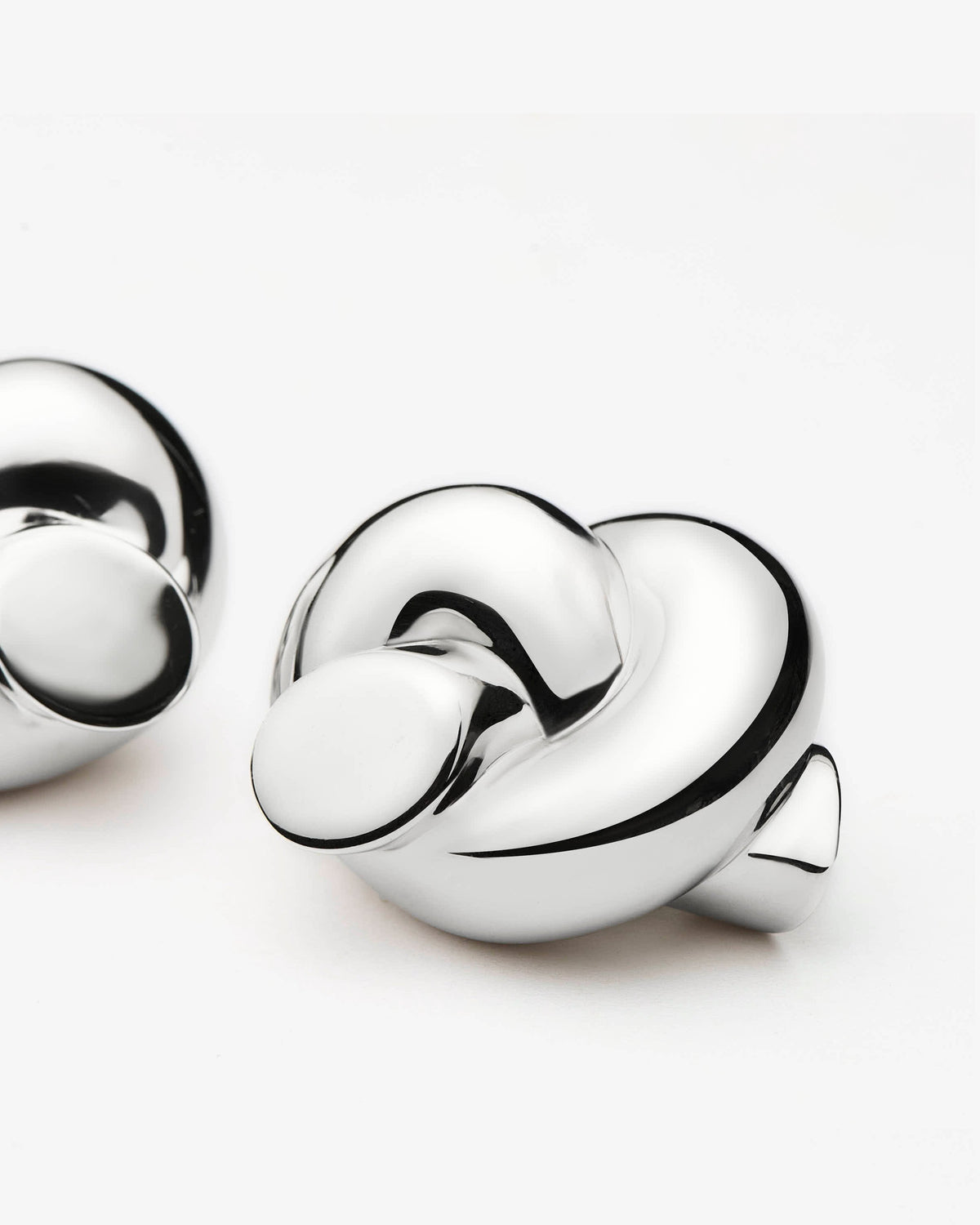 Missoma Lucy Williams Knot Oversized Stud Earrings in silver-plated brass, view 3