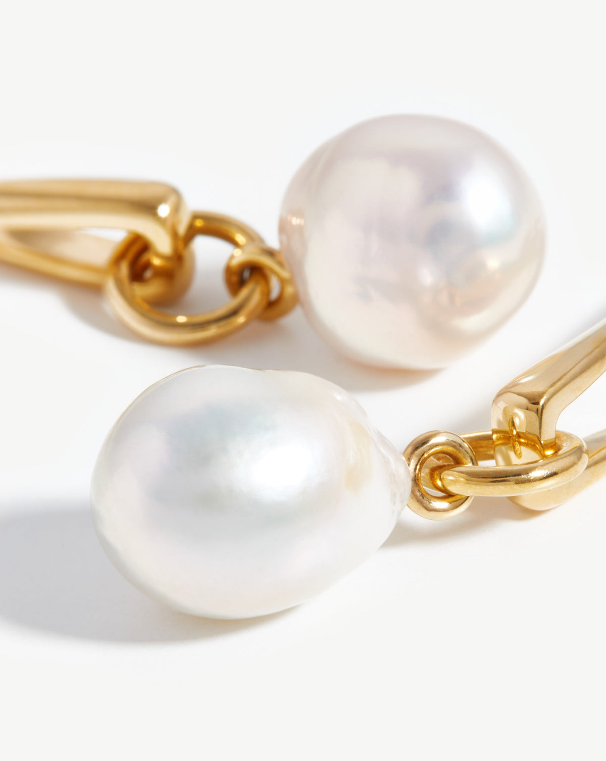 Missoma Baroque Pearl Twisted Drop Earrings in gold-plated brass, view 2