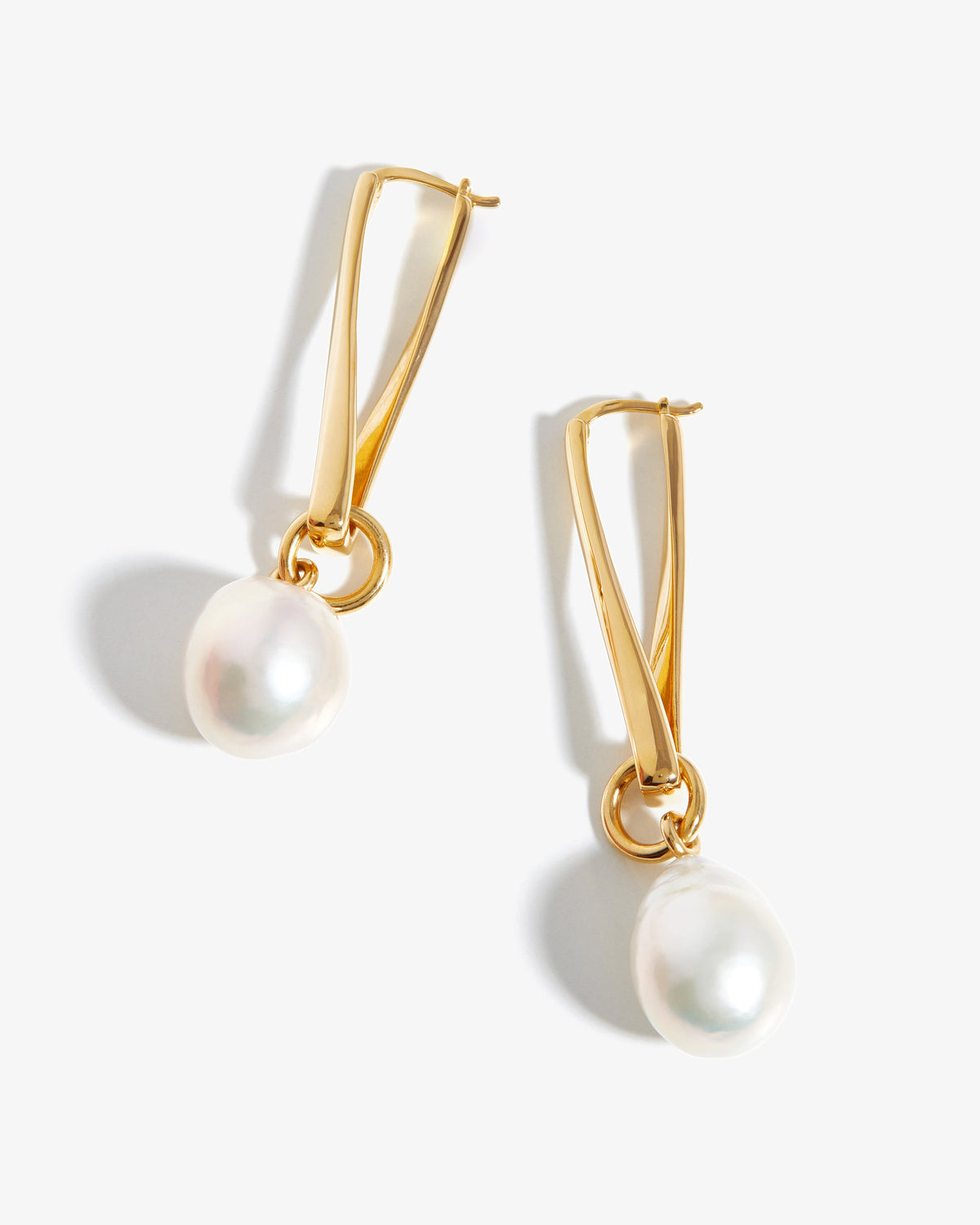 Missoma Baroque Pearl Twisted Drop Earrings in gold-plated brass