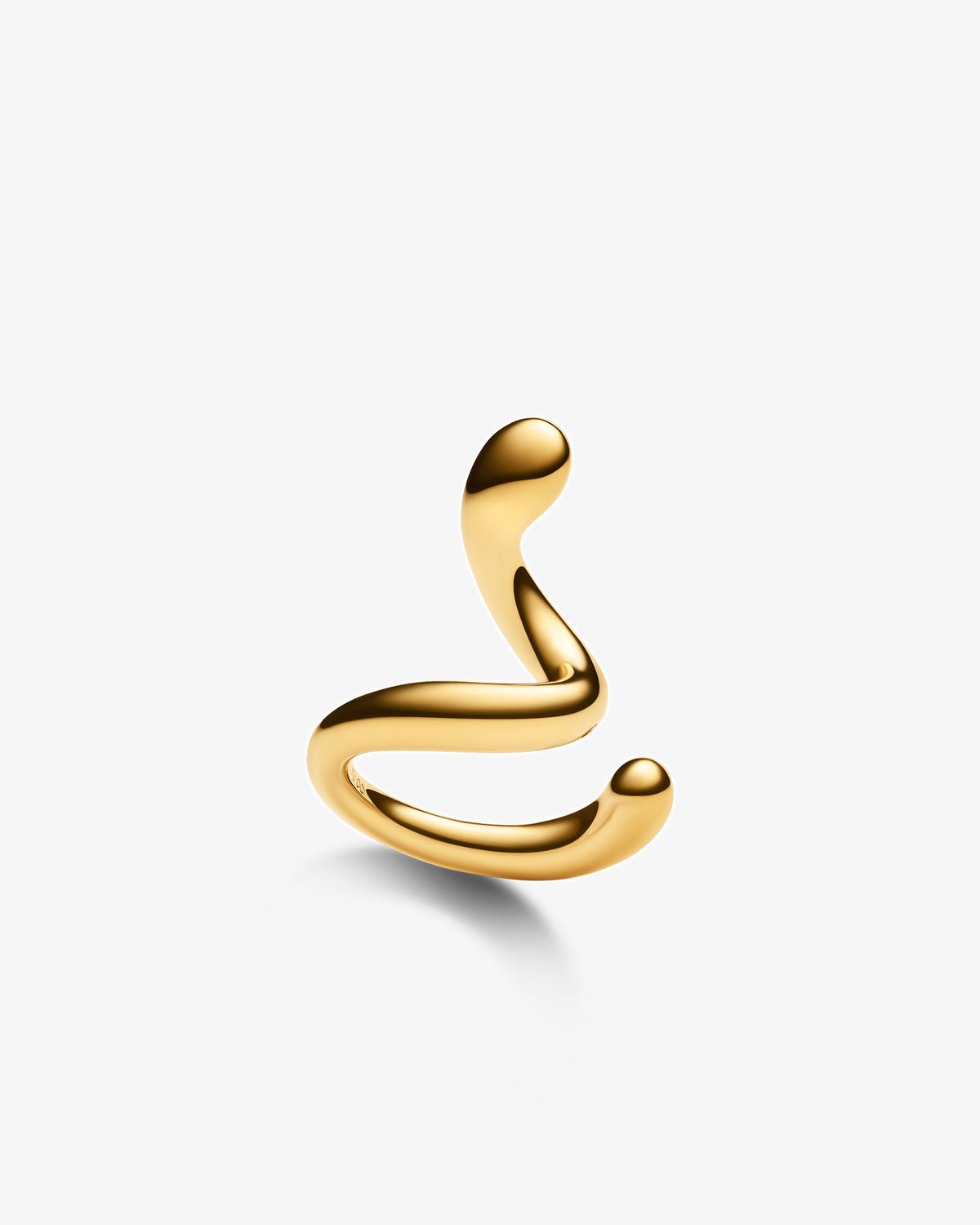 Maria Black Coil Whirl Ear Cuff in gold-plated sterling silver, angled view