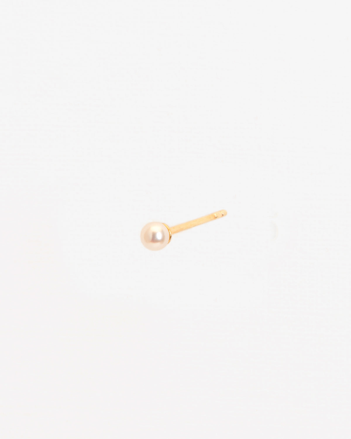 Wouters & Hendrix Gold 18K Gold Pearl Stud Single Earring, side view