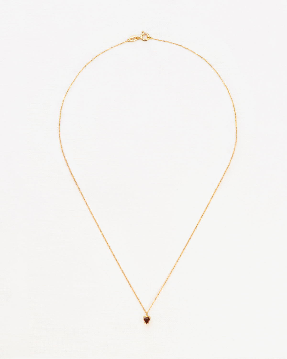 Wouters & Hendrix Gold 18K Gold Heart Garnet Pendant Necklace