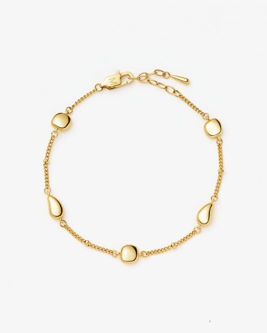 Missoma Molten Teardrop Multi Charm Bracelet in gold-plated metal