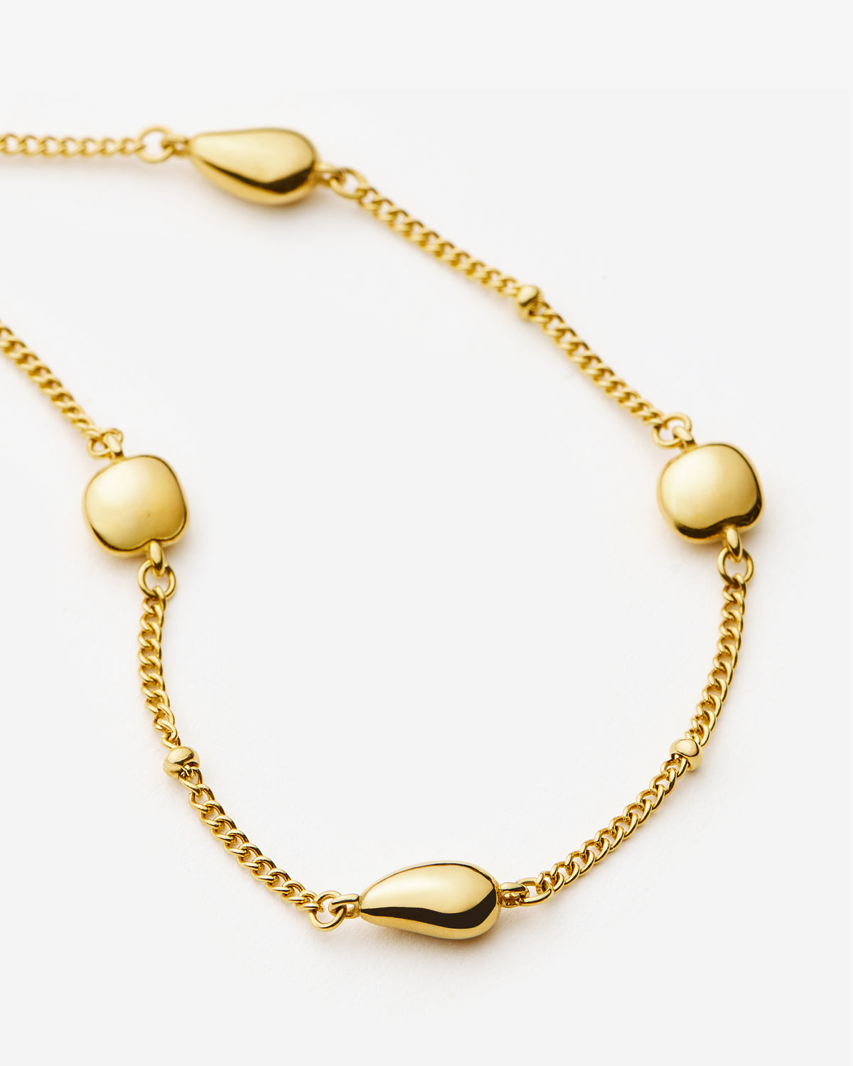 Missoma Molten Teardrop Multi Charm Bracelet in gold-plated metal, third view