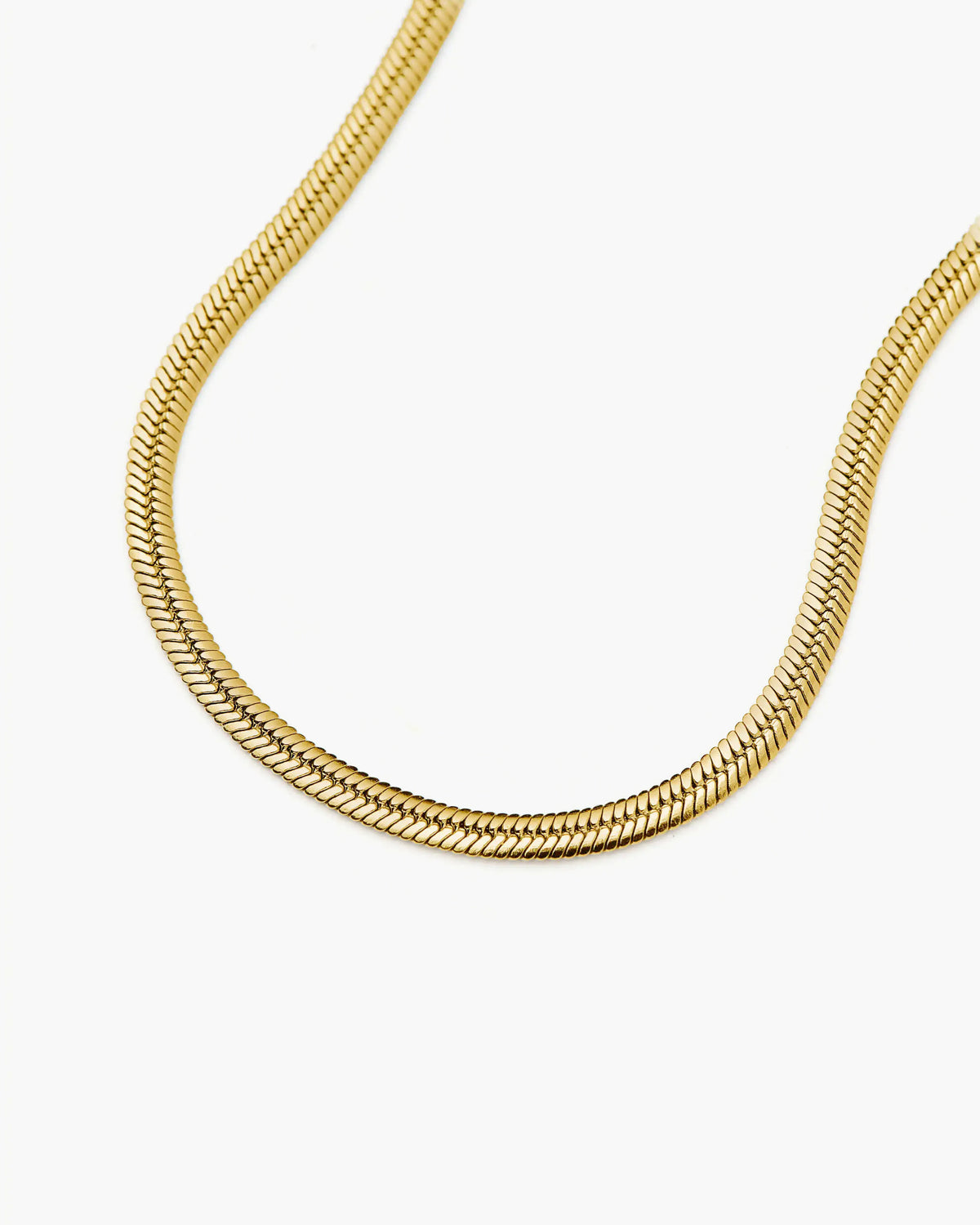 Missoma Thin Snake Chain Bracelet in gold-plated metal, third view
