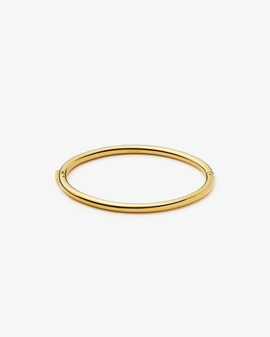 Missoma Classic Round Hinged Bangle in gold-plated metal