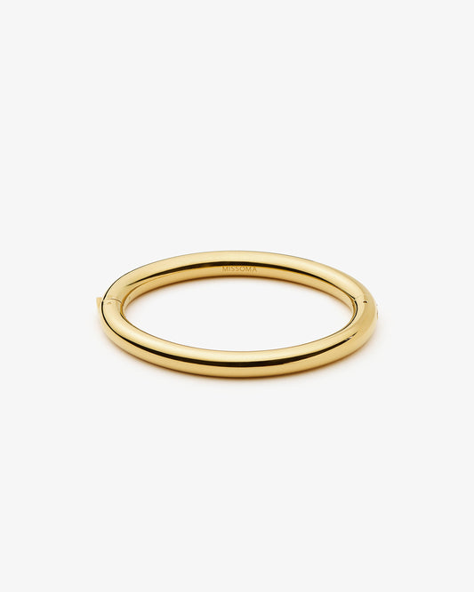 Missoma Chunky Round Hinged Bangle in gold-plated metal