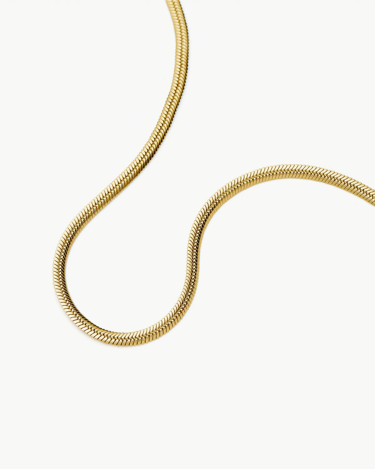 Missoma Thin Snake Chain Necklace in gold-plated metal, third view