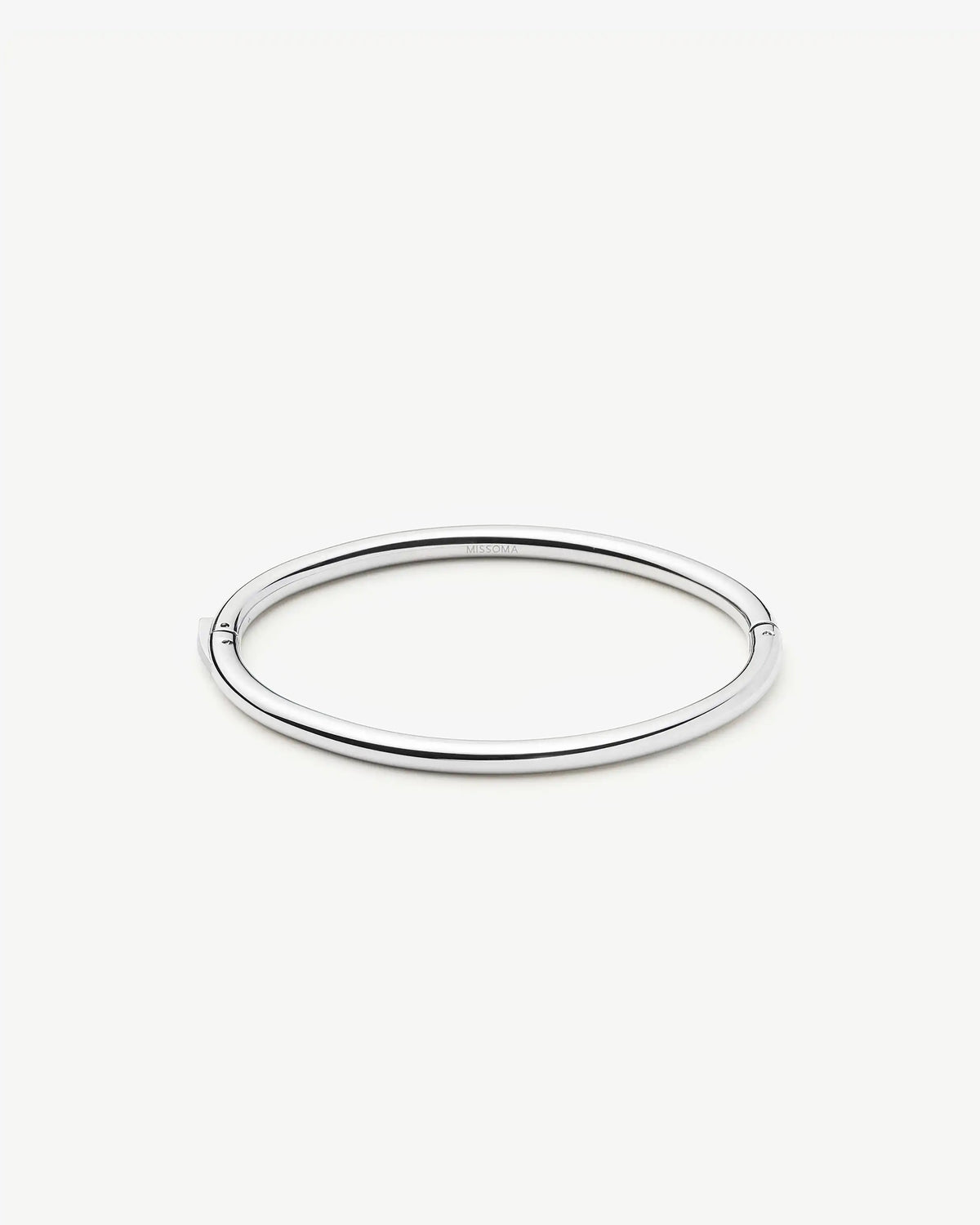 Missoma Classic Round Hinged Bangle in silver/rhodium-plated metal