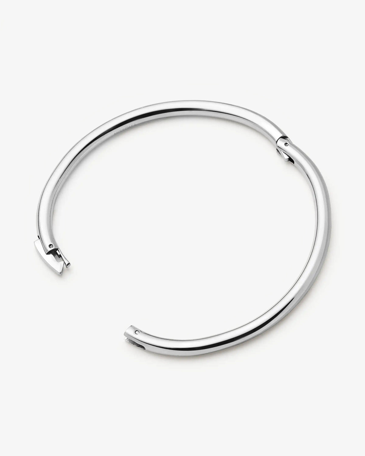 Missoma Classic Round Hinged Bangle in silver/rhodium-plated metal, second view