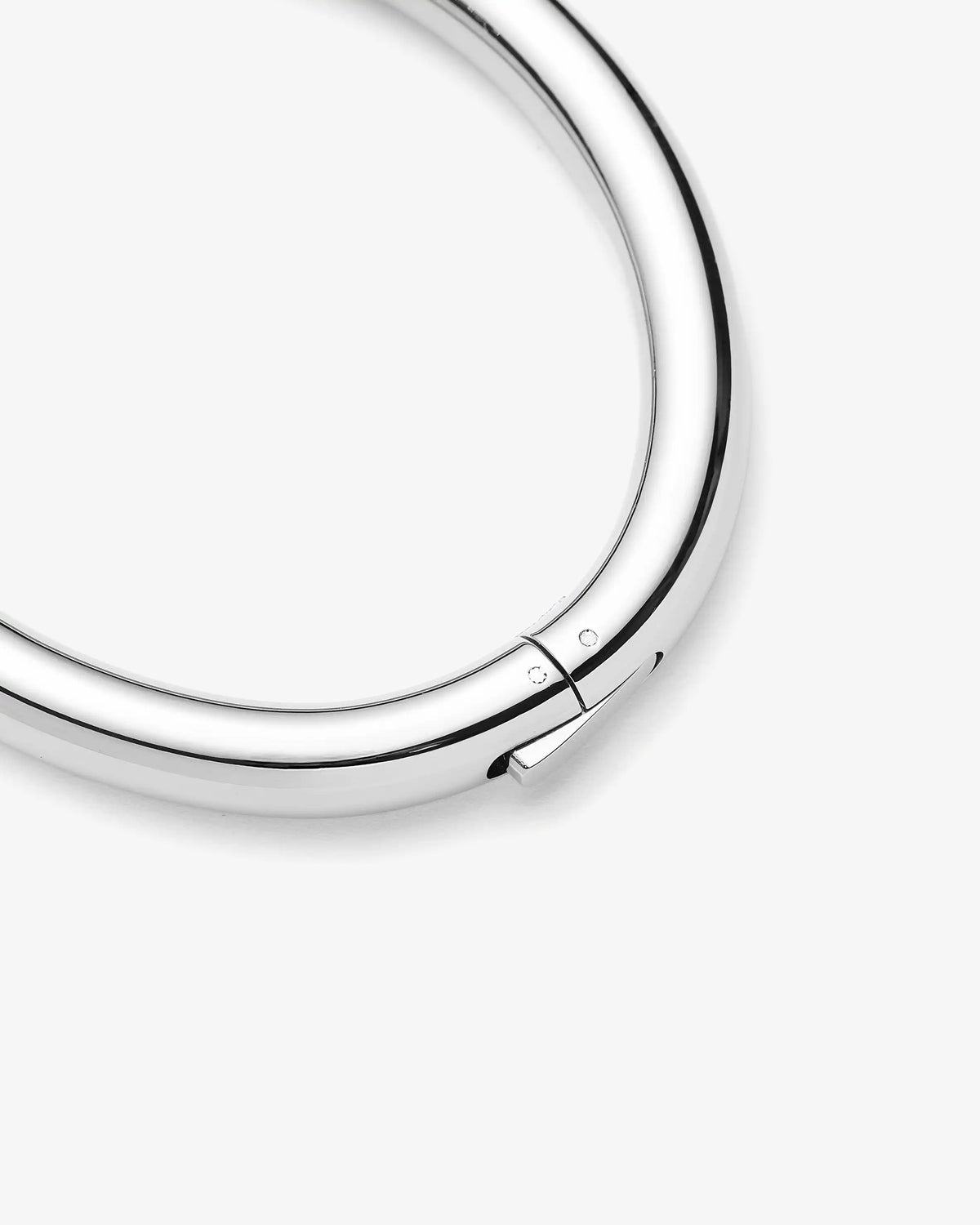 Missoma Chunky Round Hinged Bangle in silver/rhodium-plated metal, third view