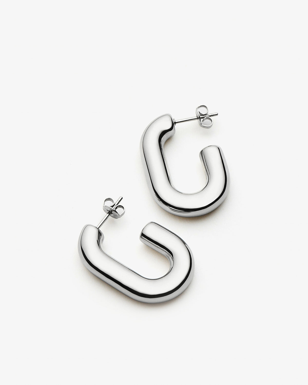 Missoma Chubby Oval Medium Hoop Earrings in silver/rhodium-plated metal, second view