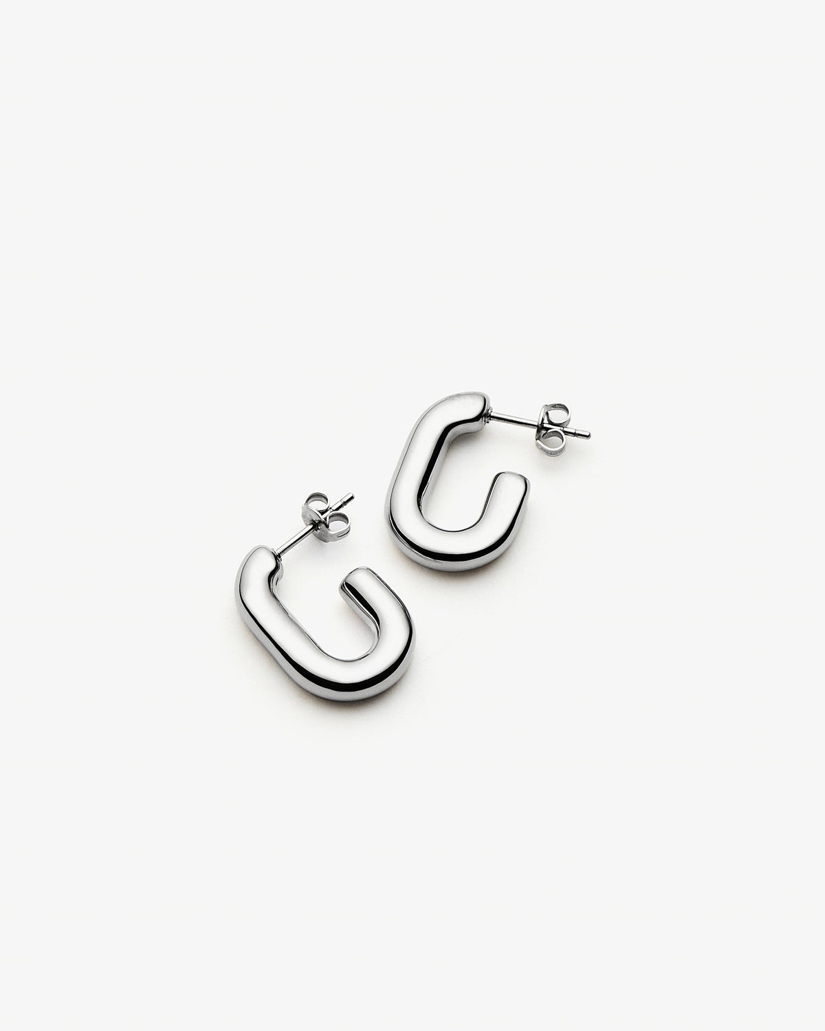 Missoma Chubby Oval Small Hoop Earrings in silver/rhodium-plated metal, second view